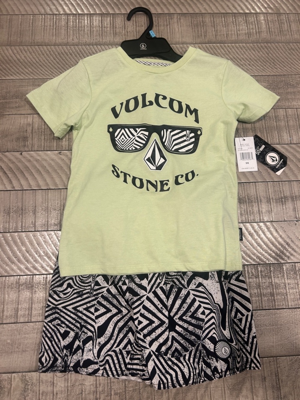Volcom Light Green Logo Tee with Black & White Patterned Shorts
